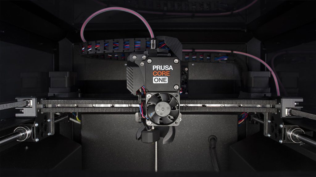 Prusa core one 挤出机和皮带驱动 corexy 机构的特写。照片来自 prusa research。